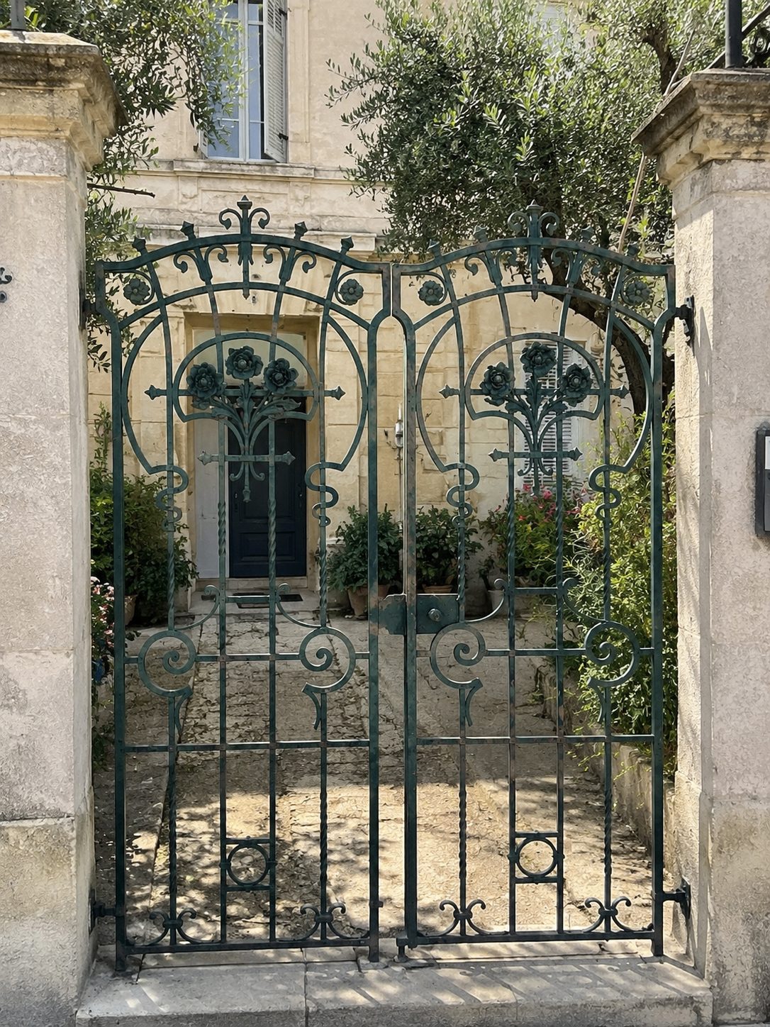 Same wrought-iron gates installed at the entrance of a Provençal home